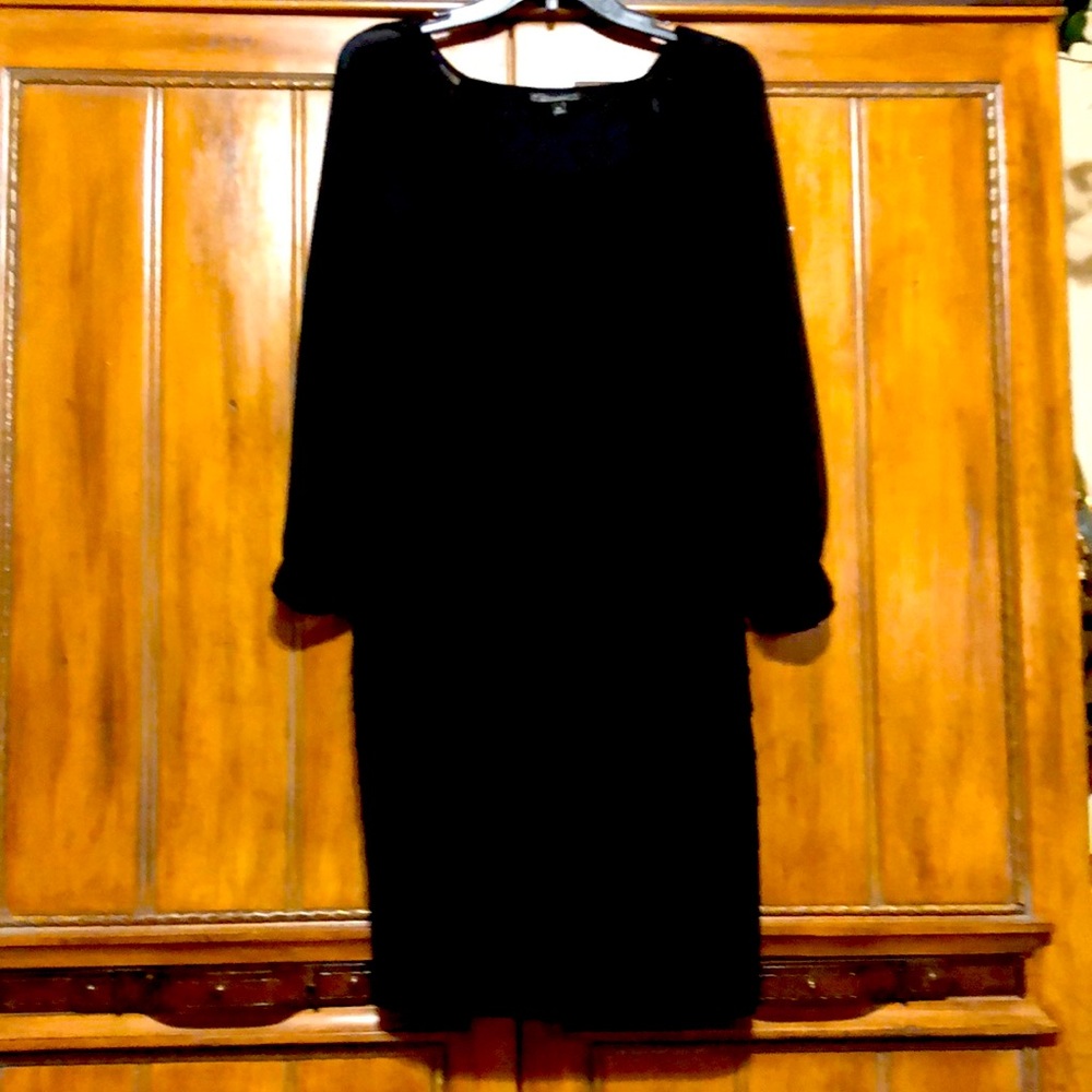 Here is your little black dress! Elegant, long sleeve with sequins on cuffs.